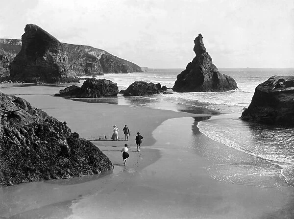 People on the beach at Bedruthan Steps, St Eval, Cornwall. Around 1900