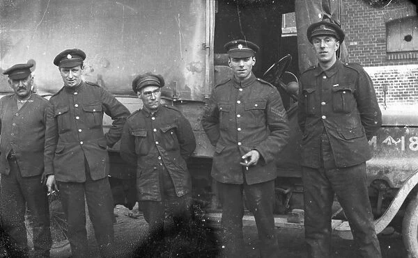 Soldiers in front of a military covered lorry, Cornwall. 1916
