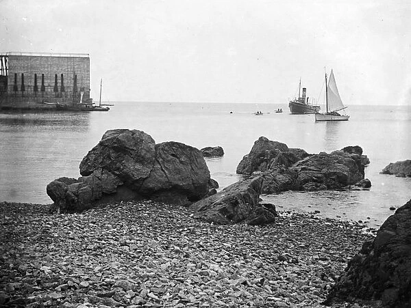 Stone barges at the jetty, Porthoustock, St Keverne, Cornwall. Early 1900s