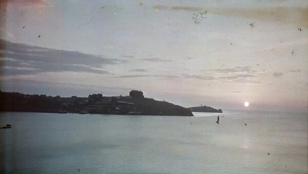 Sunset over Newquay, Cornwall. Around 1925