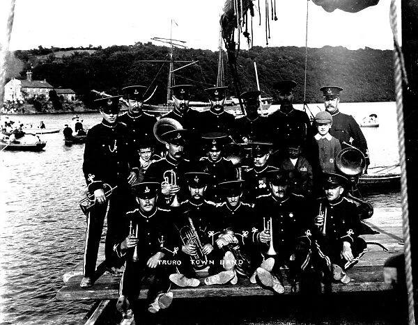 Truro Town Band at Malpas regatta, Cornwall. Probably 1909
