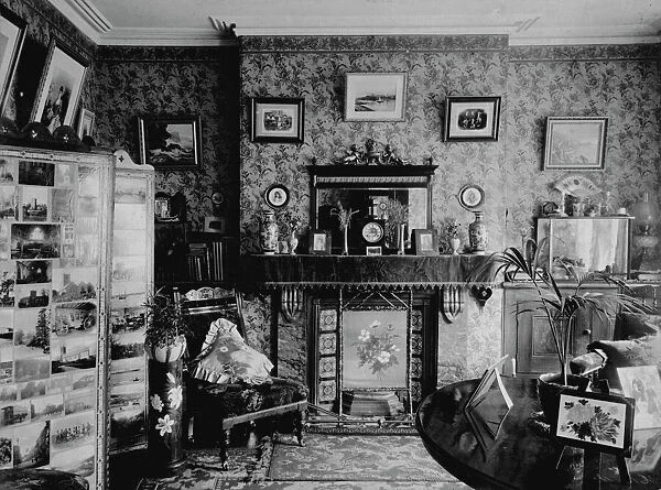 A view of the living room in Samuel John Govier s house, Chacewater, Cornwall. Early 1900s