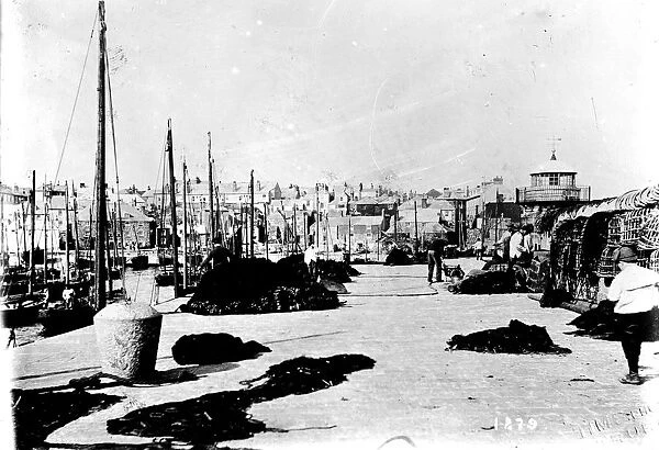 View along Smeatons Pier towards the town, St Ives, Cornwall. Around 1900
