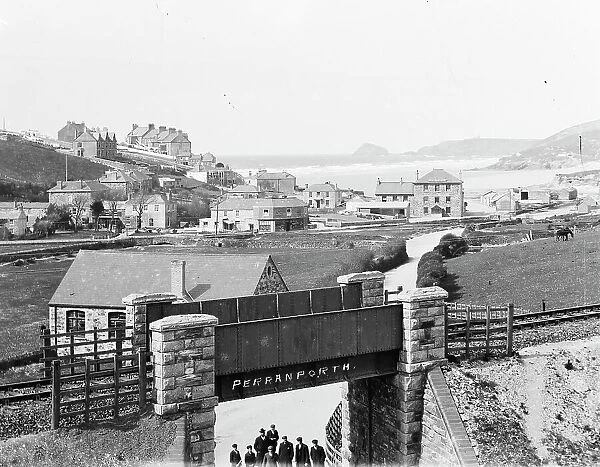 View of town and beach over the railway bridge, Perranporth, Perranzabuloe, Cornwall. Early 1900s