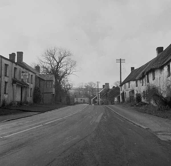 View through the village, Mitchell, St Newlyn East, Cornwall. 1957