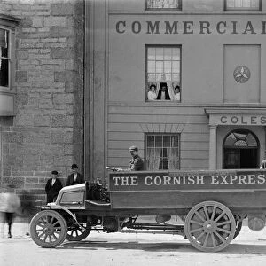 The Cornish Express motor bus (Penzance to St Just) outside the Commercial Hotel in Market Square, St Just, Cornwall. Before 1906
