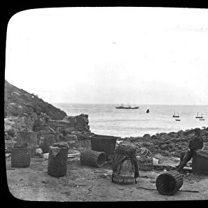 The cove and bay with crab and lobster pots, Porthgwarra, Cornwall. Early 1900s