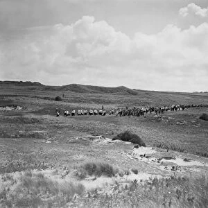 A distant view of Bishop Frere in procession to St Pirans Oratory, Perranzabuloe, Cornwall. Between 1923 and 1935