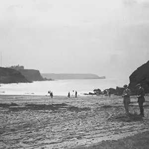 A distant view of two Marconi wireless towers and the Poldhu Hotel, Poldhu, Mullion, Cornwall. Probably 1920s