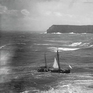 Fishing boat in rough sea approaching the Camel Estuary, Padstow, Cornwall. Early 1900s