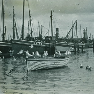 Fishing boats in harbour St Ives harbour, Cornwall. Around 1925