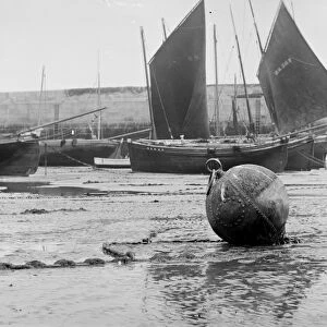 Fishing craft off Smeatons Pier at low tide. St Ives Harbour, Cornwall. Before 1900
