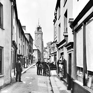 Fore Street, looking north towards the town hall clock tower, East Looe, Cornwall. 2nd June 1904
