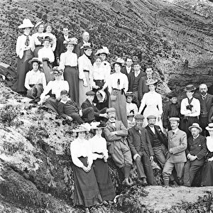 A group posed by the rocks at Godrevy, Gwithian, Cornwall. Early 1900s