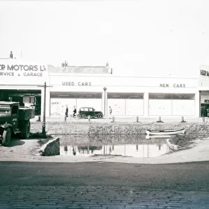 H. T. P. Motors Ltd, Back Quay, Truro, Cornwall. Taken before the the last section of the river was covered over in 1938