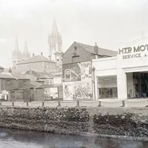 H. T. P. Motors Ltd from the River Kenwyn, Back Quay, Truro, Cornwall. April 1936