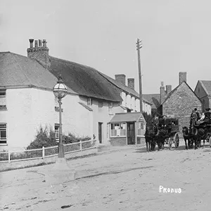 Horse buses in The Square, Probus, Cornwall. Early 1900s