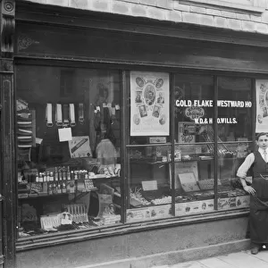 J. Buzzas Haircutting and Shampooing Rooms, Duke Street, Truro, Cornwall. Early 1900s