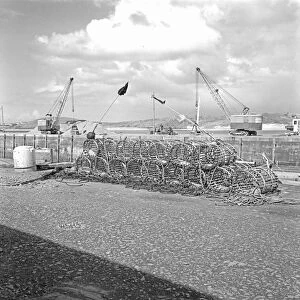 Lobster pots on Fish Quay, Padstow Harbour, Cornwall. 1968