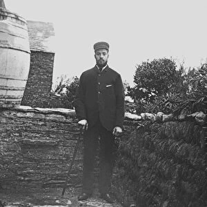 A man posed in a back garden in or near Padstow, Cornwall. Probably 1890s or early 1900s