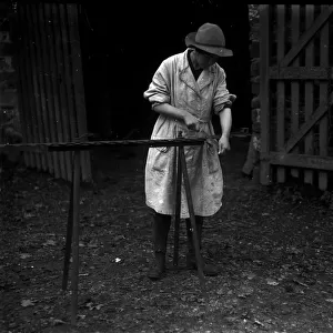 Member of the First World War Womens Land Army. Tregavethan Farm, Truro, Cornwall. Autumn 1917