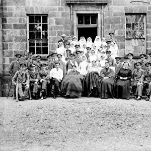 Patients and nurses outside the Royal Cornwall Infirmary, Truro, Cornwall. Probably 1916