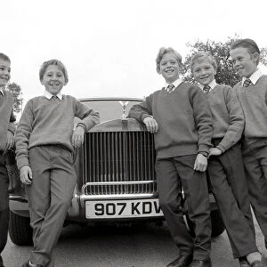 Pupils travel to school in a Rolls Royce, Lostwithiel, Cornwall. September 1989