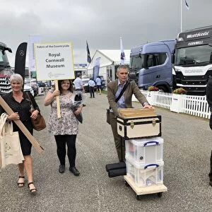 Royal Cornwall Museum staff leaving the Royal Cornwall Show, Royal Cornwall Showground, Whitecross, Wadebridge, Cornwall. 8th June 2018