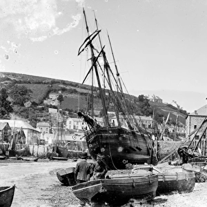 A schooner and other boats, East Looe Quay, Looe, Cornwall. Around 1890