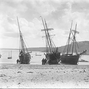 Three schooners beached in St Ives Harbour, Cornwall. Early 1900s