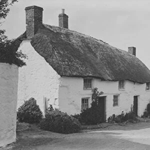 Thatched cottages in Mullion village, Cornwall. 1908