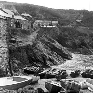 View down slipway to boats and cliff beyond, Portloe, Veryan, Cornwall. 21st August 1911