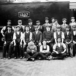 Workers in front of locomotive GWR 1307. Possibly around 1895
