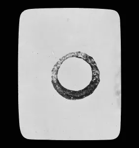 Bronze ring from excavation of Iron Age cemetery at Harlyn Bay, St Merryn, Cornwall. 1900-1906