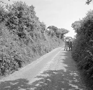 St Hilary Collection: Charles Woolf and Dorothy Dudley in a country lane near Relubbus, St Hilary, Cornwall. 1969