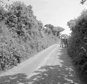 Charles Woolf and Dorothy Dudley in a country lane near Relubbus, St Hilary, Cornwall. 1969