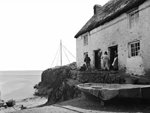 Cadgwith Collection: A cottage by the sea in Cadgwith harbour, Cornwall. 1894