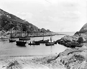 Polperro Collection: Cove below Harbour, Polperro, Cornwall. Early 1900s