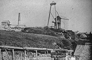 Redruth Collection: Two Engine houses at Wheal Sparnon with cottages in the background, Redruth, Cornwall. Around 1865