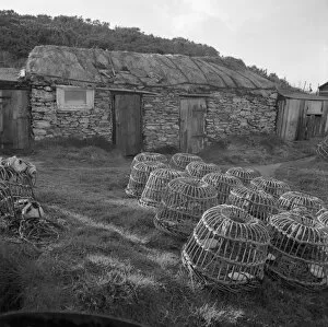 St Hilary Collection: Fishermens huts and lobster pots, Prussia Cove, St Hilary, Cornwall. 1970