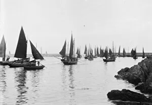 Mevagissey Collection: Fishing vessels putting to sea, Mevagissey, Cornwall. 1909