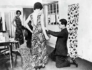 Images Dated 3rd December 2018: George Criscuolo fitting an evening gown of Crysede silk, St Ives, Cornwall. Around 1927