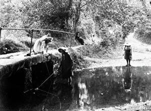 Kenwyn Collection: Three girls fishing in the River Kenwyn at the ford and footbridge, Treliske Lane, Newmills