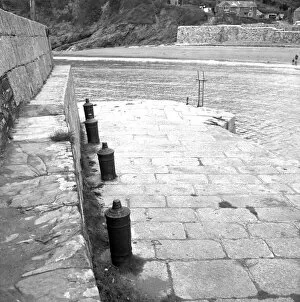 Images Dated 8th March 2018: Harbour wall with cannon bollards, Polkerris, Tywardreath, Cornwall. 1976