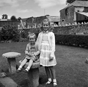 Images Dated 12th April 2018: Little girls at Shillingham Manor Farm, St Stephens by Saltash, Cornwall. 1961