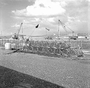 Images Dated 14th August 2018: Lobster pots on Fish Quay, Padstow Harbour, Cornwall. 1968