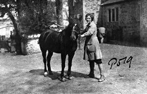 Women's Land Army Collection: Member of the First World War Womens Land Army with a horse, Tregavethan Farm, Truro, Cornwall. 1918