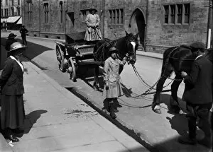 Images Dated 24th April 2017: Members of the First World War Womens Land Army leading a horse and cart in Truro, Cornwall