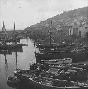 Images Dated 26th March 2019: Mousehole harbour, Cornwall. Probably 1925
