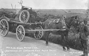 Transport Collection: Mr A. W. Gills motor vehicle on a cart after being destroyed by fire